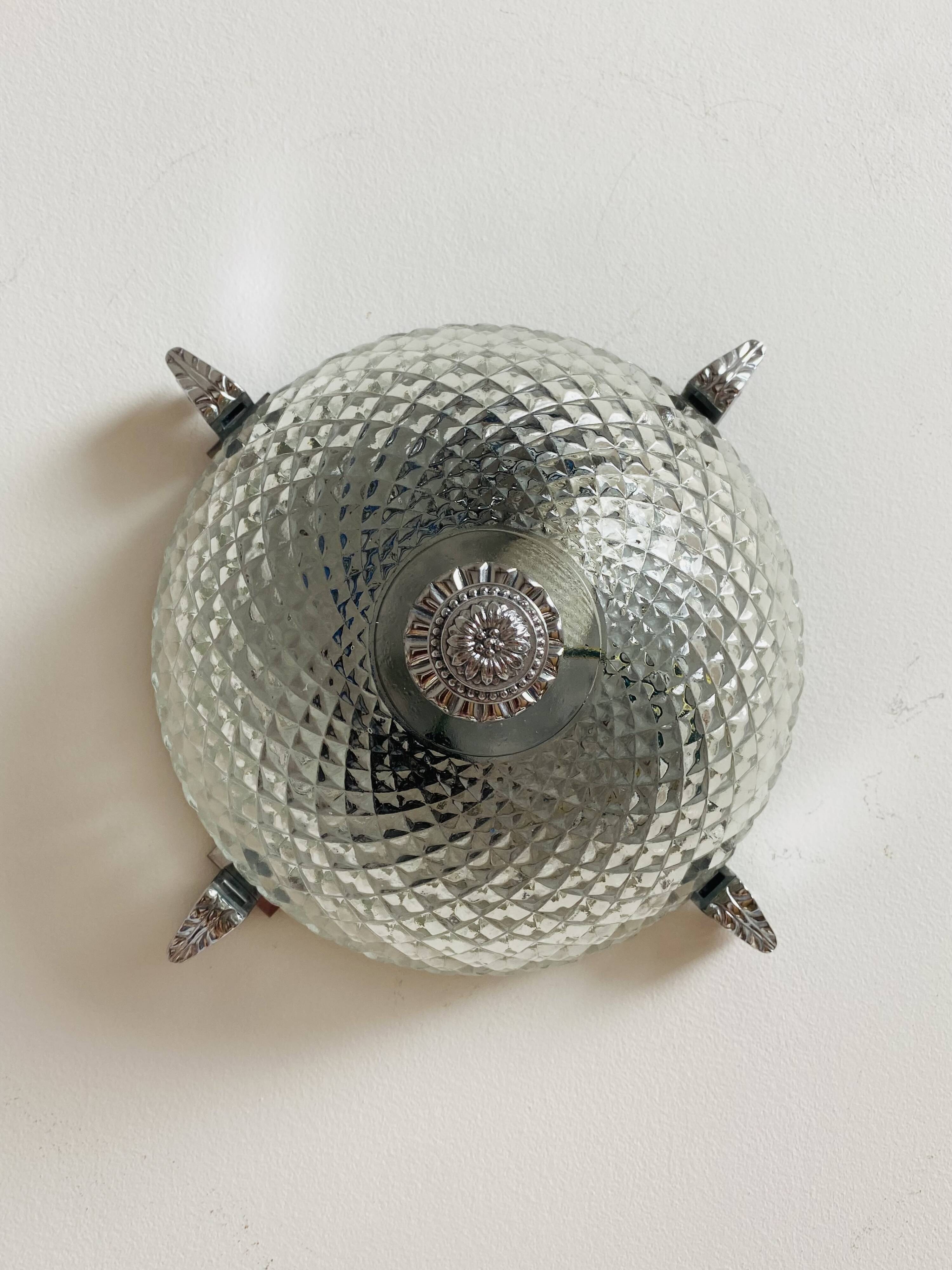 Pair of chrome-plated glass sconces