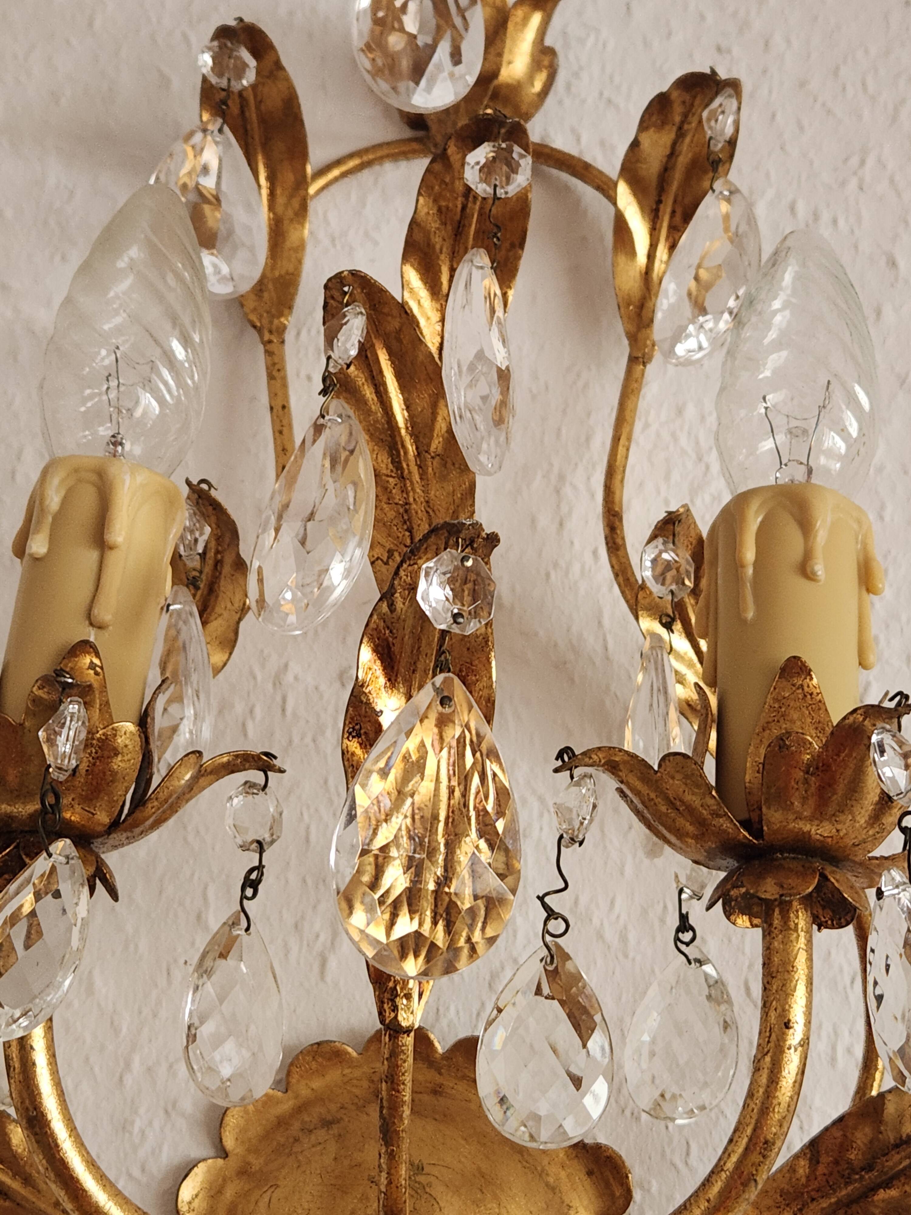 Hand-forged wall lamp gilded with gold leaf and crystals, Italy