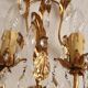 Hand-forged wall lamp gilded with gold leaf and crystals, Italy