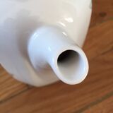 Vintage porcelain coffee or teapot with milk jug