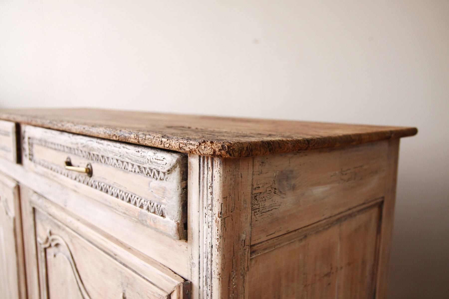 Patinated and sculpted buffet