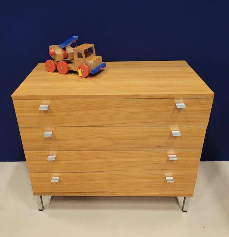 Solid wood chest of drawers with chrome legs from the 1970s.