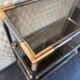 Vintage Italian design console in brass and smoked glass
