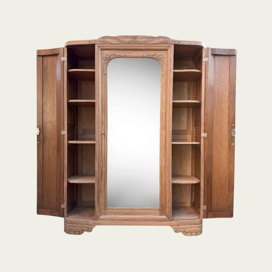 Art Deco wardrobe with bevelled mirror in solid raw walnut.