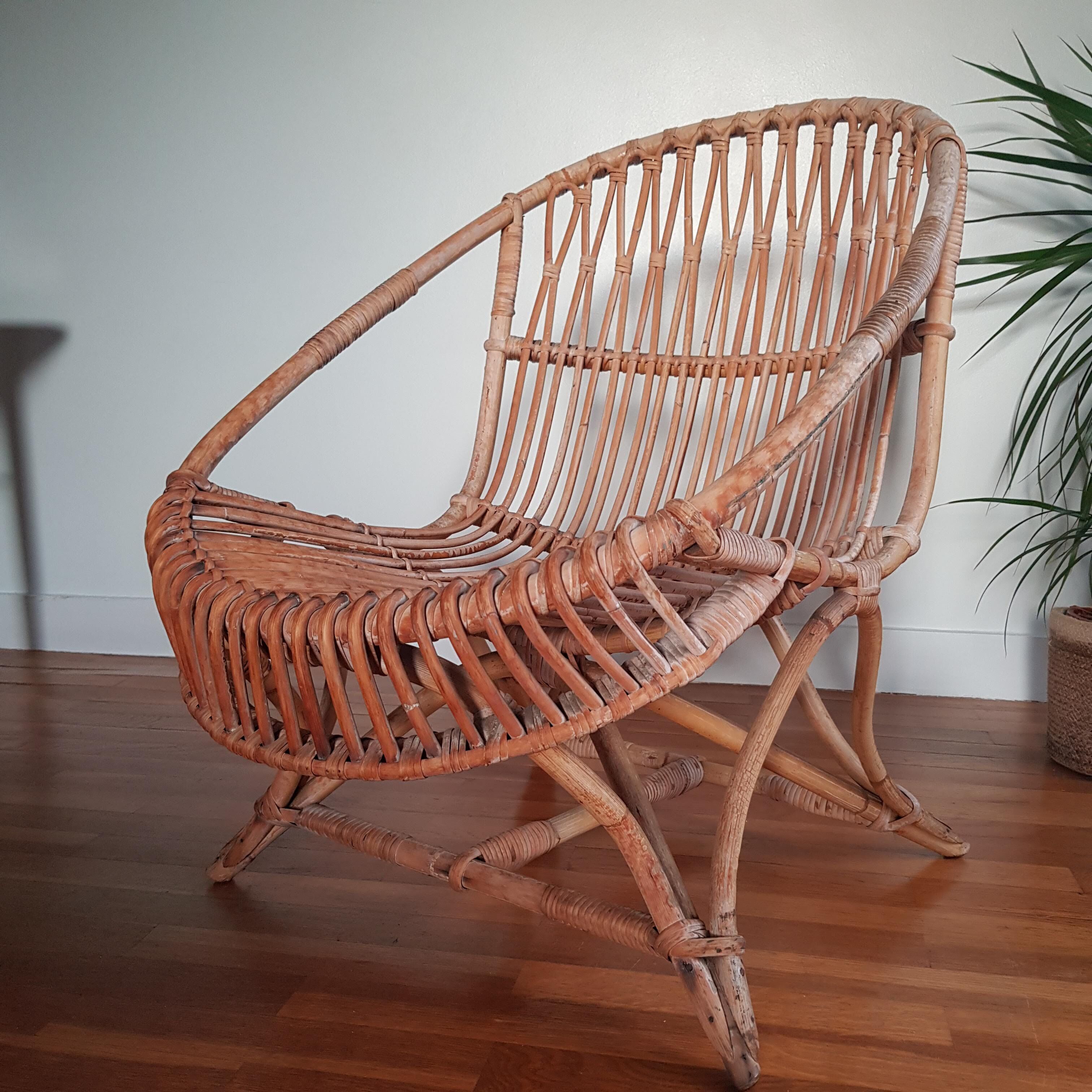 Vintage rattan armchair original shell shape