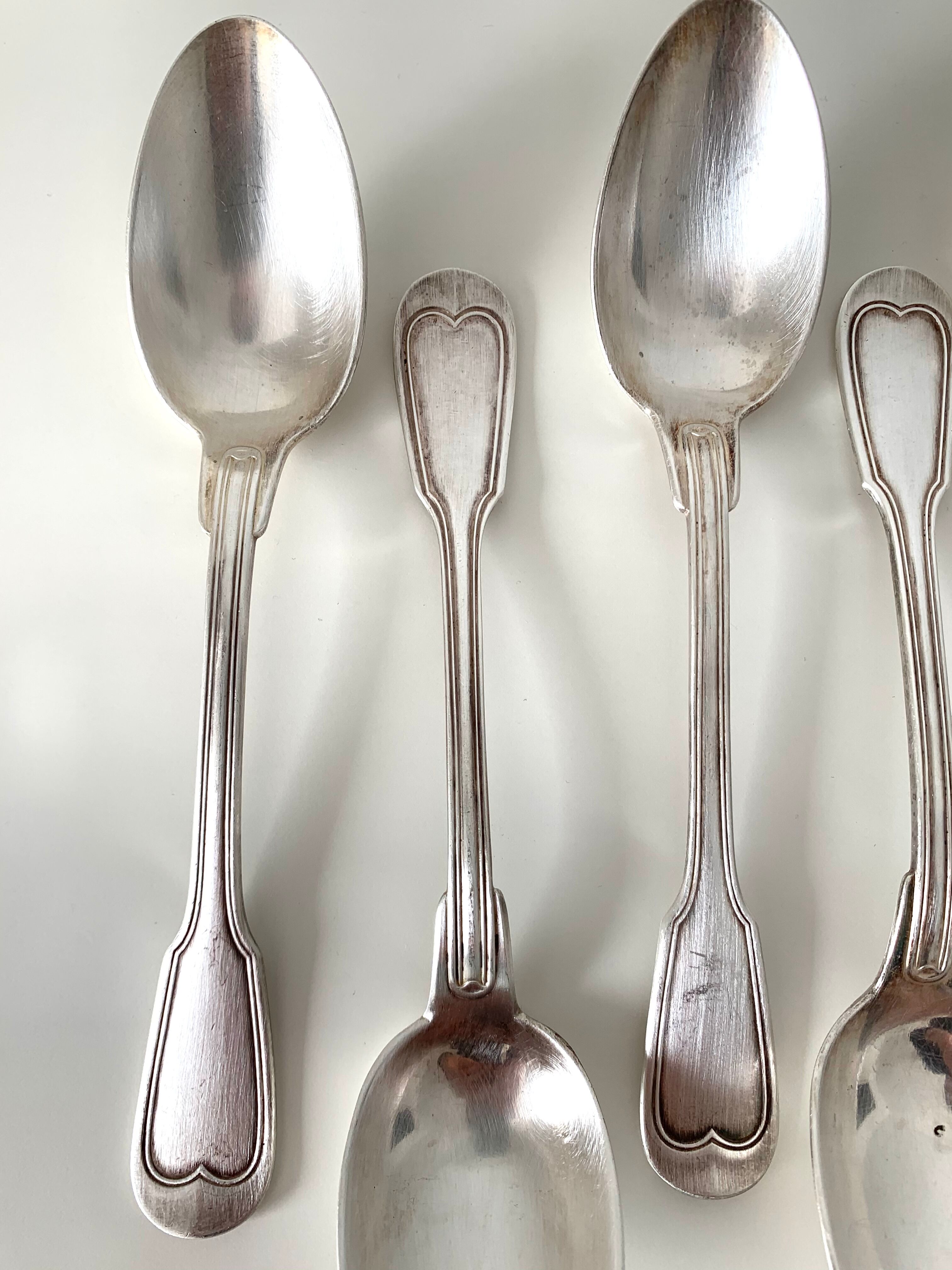 10 silver metal spoons