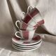 Cups and saucers from the 1960s.