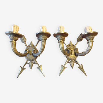 Pair of empire style bronze arrow wall lights