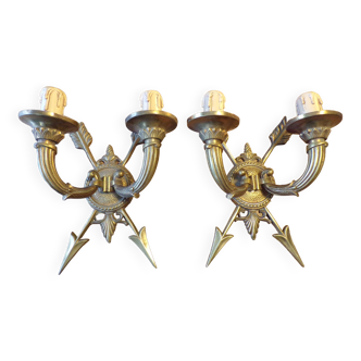 Pair of empire style bronze arrow wall lights