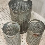 Vintage set of perforated metal waste bins