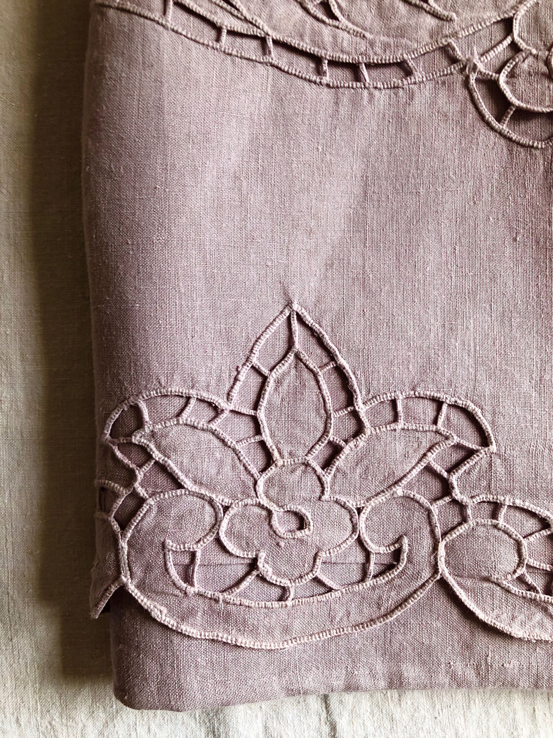 Old embroidered towel tinted purple aurora