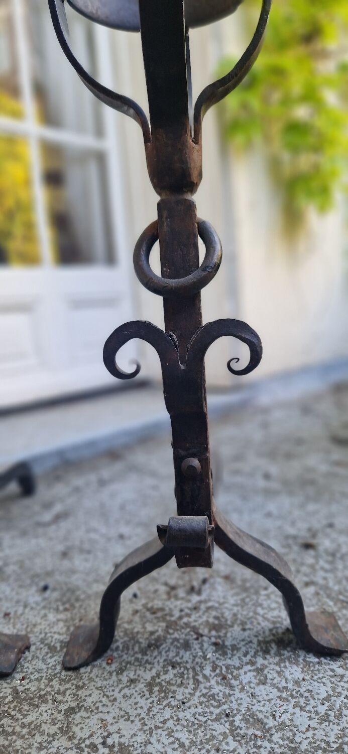 Pair of wrought iron andirons by Landier from the 17th century.