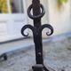 Pair of wrought iron andirons by Landier from the 17th century.