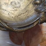 Empty bronze pocket of ore puppet