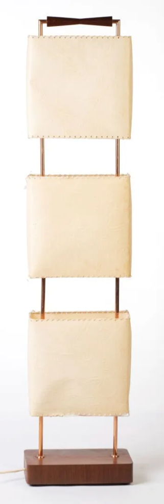 Wood and copper metal floor lamp with parchment.