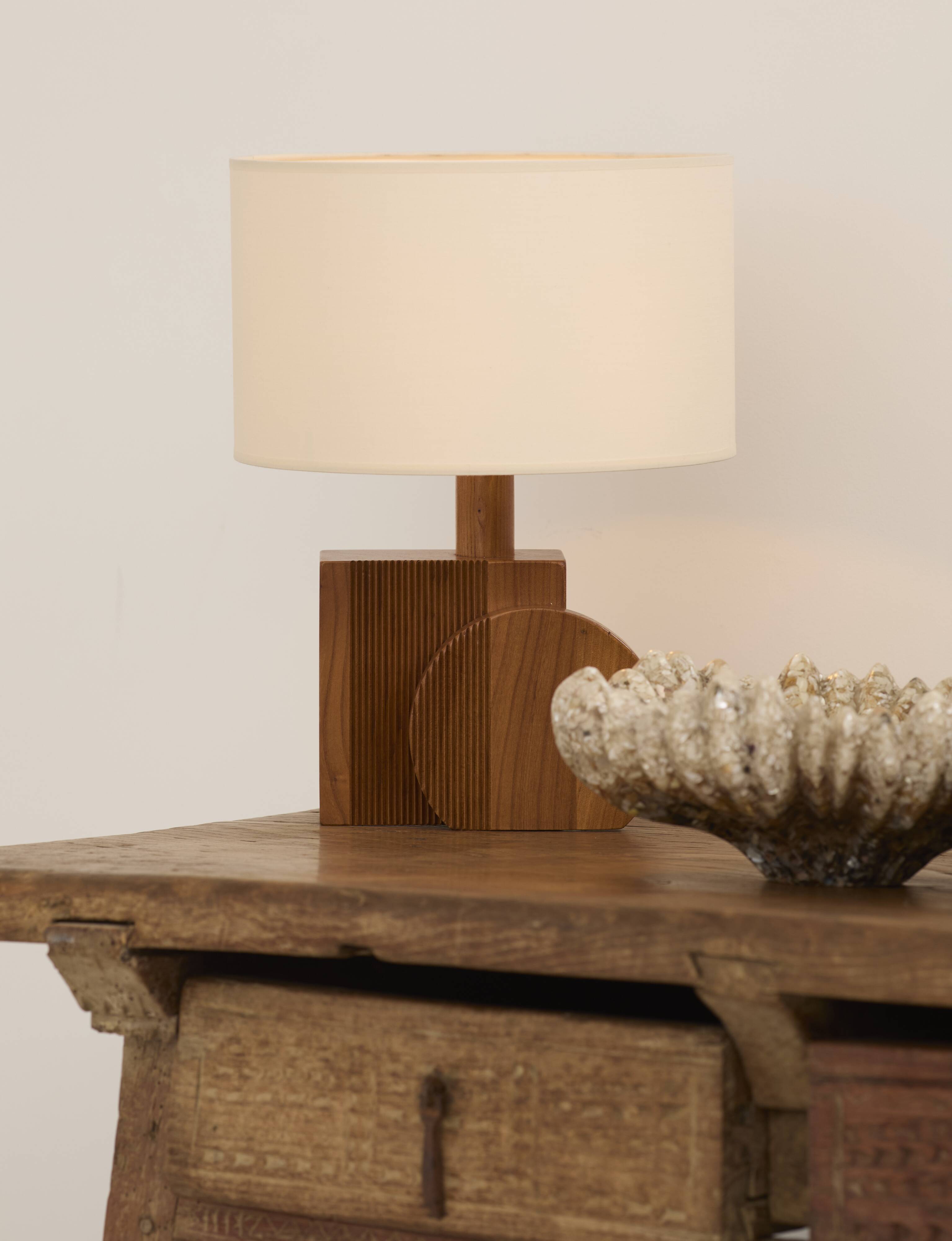Pair of geometric handcrafted lamps in solid oak circa 1970.