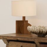 Pair of geometric handcrafted lamps in solid oak circa 1970.