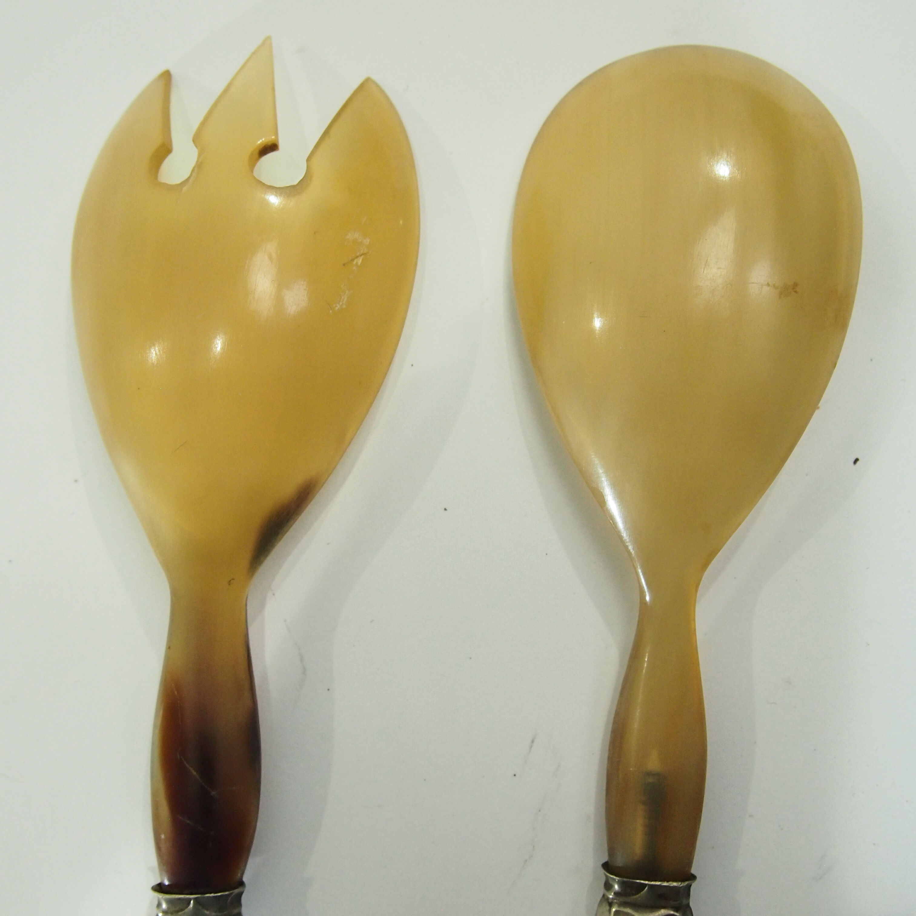 Bone and metal filled salad servers