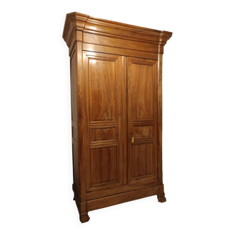 Early 19th century walnut castle wardrobe
