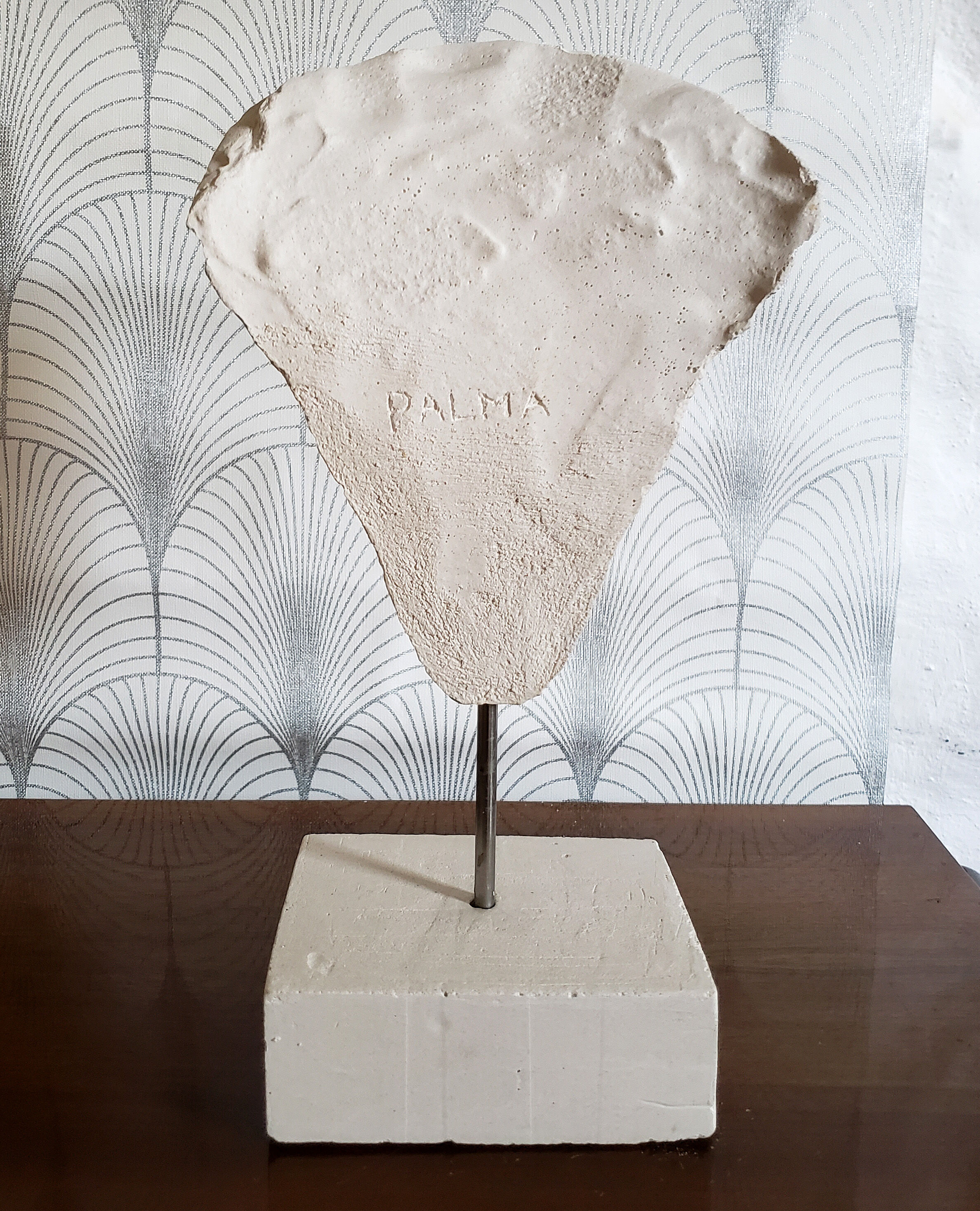 Head on plaster base
