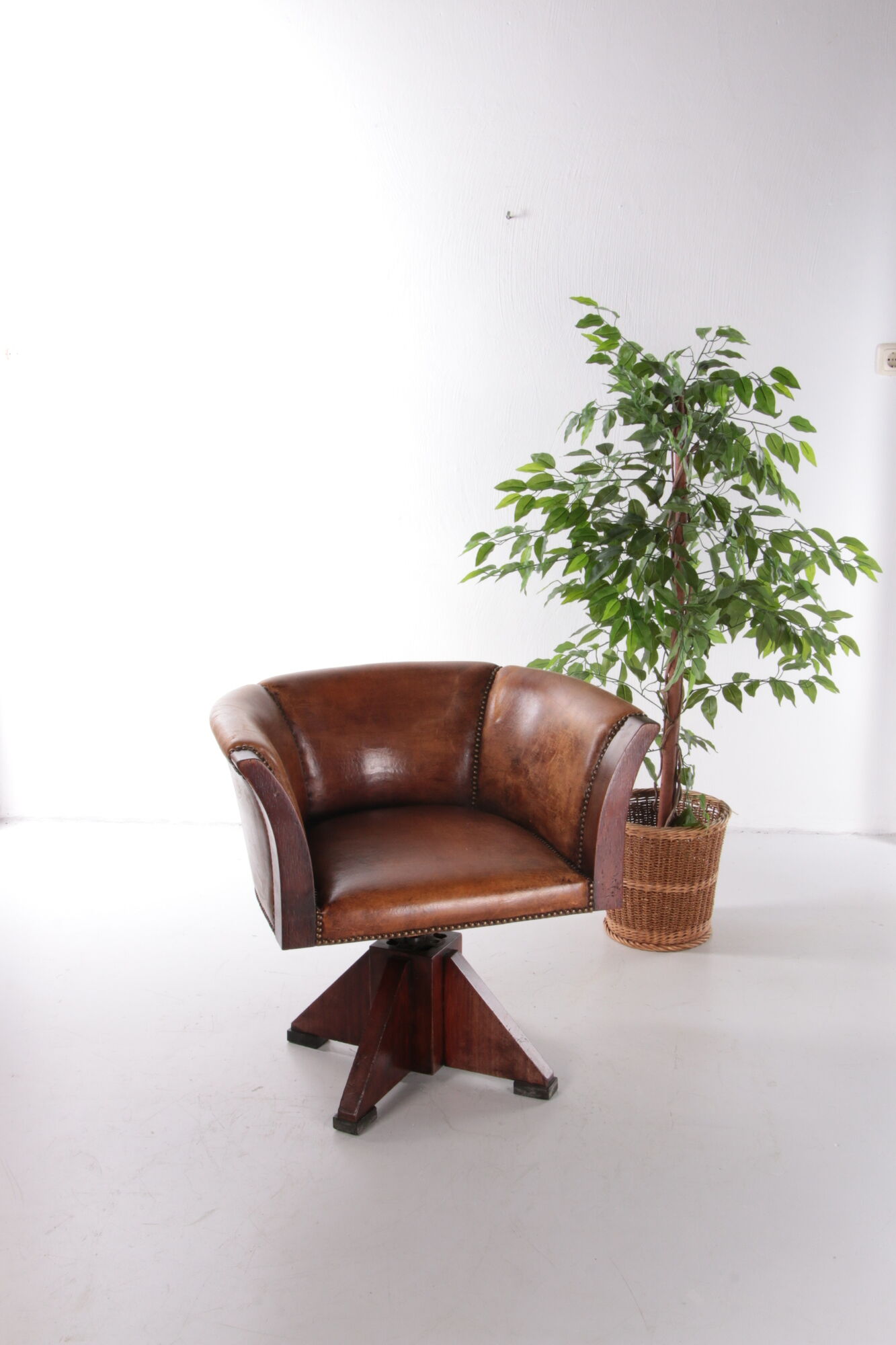 Sheepskin leather desk chair with wooden swivel base, 1970