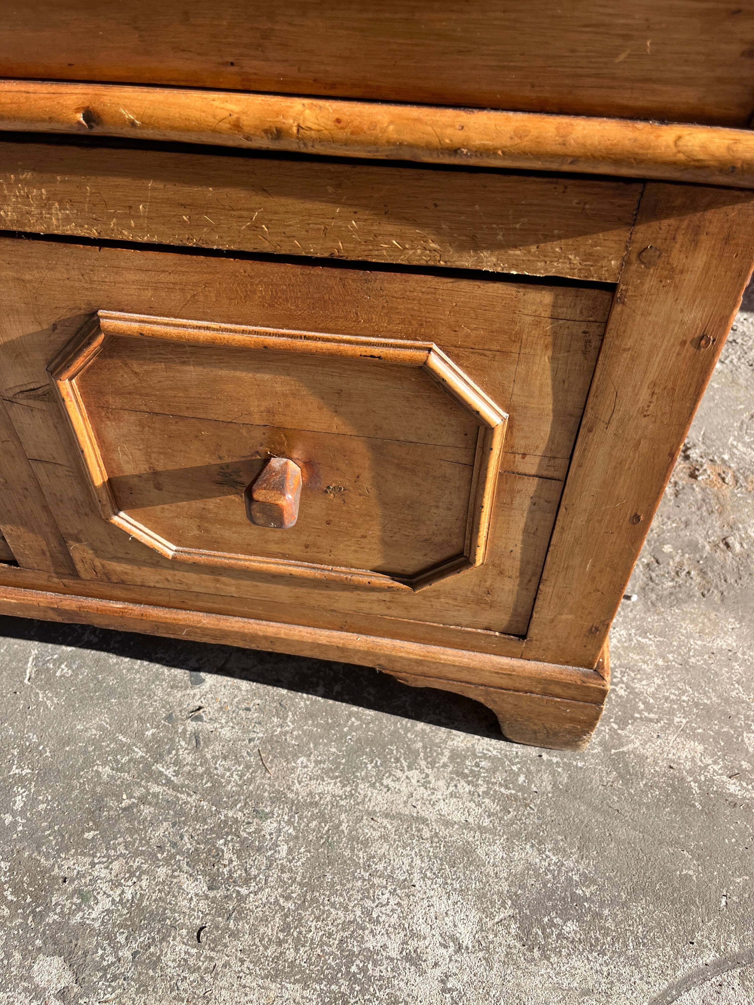 Old wooden baker's chest with storage drawers