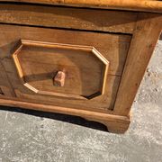 Old wooden baker's chest with storage drawers