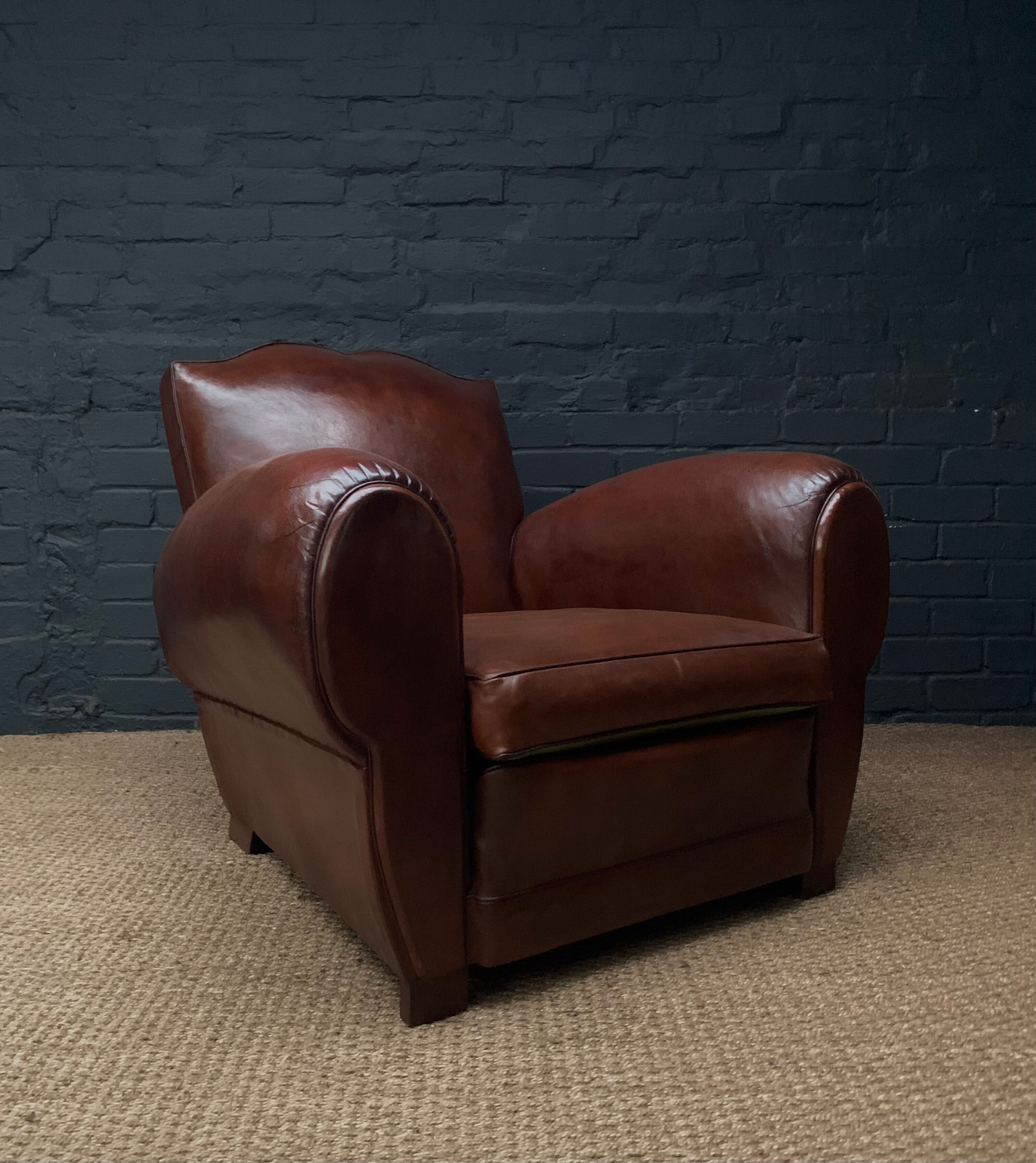 Leather club chair, havana moustache model, with cuban cigar arms, circa 1930's