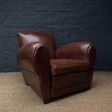 Leather club chair, havana moustache model, with cuban cigar arms, circa 1930's