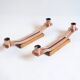 Pair of oak and copper bronze candlesticks