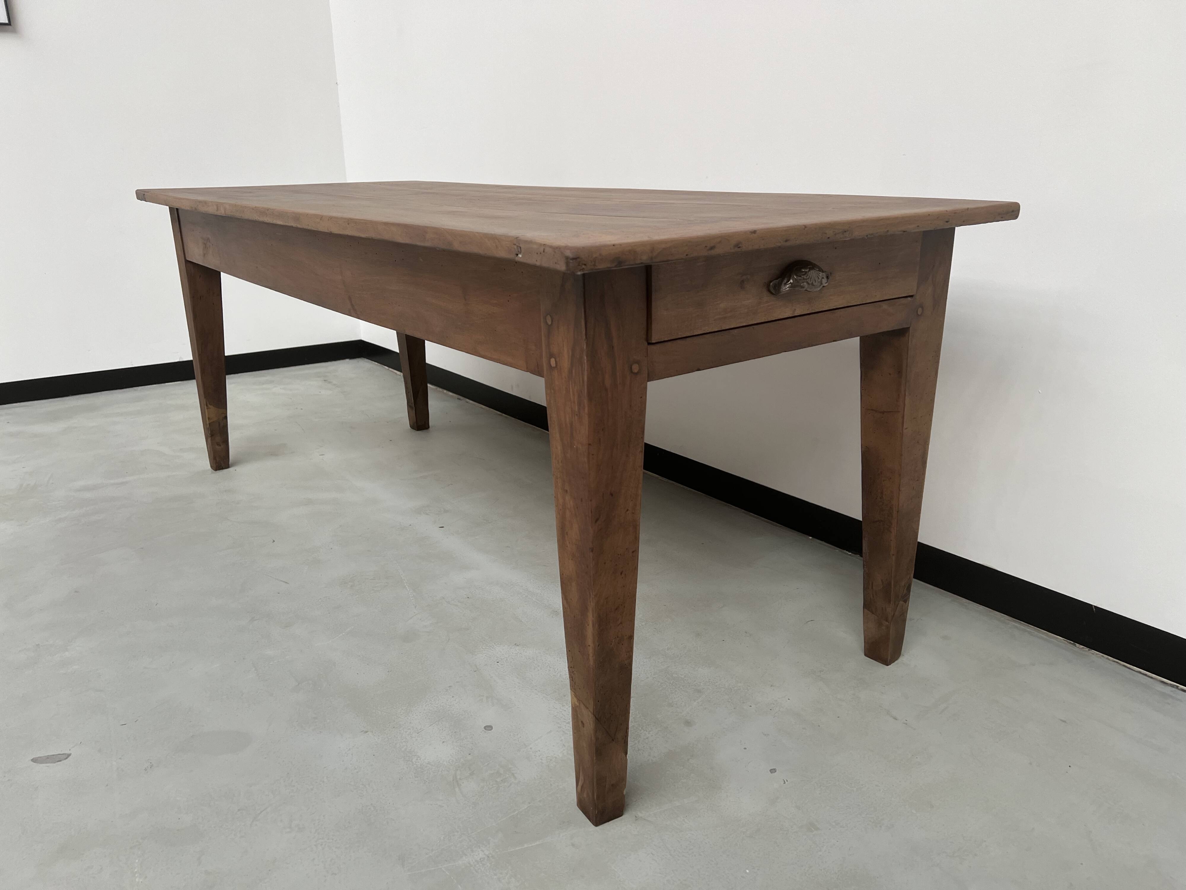 Solid walnut farmhouse table with spindle legs