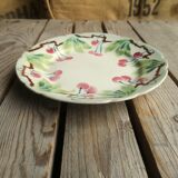 Old decorative plate in barbotine by luneville cherry motif