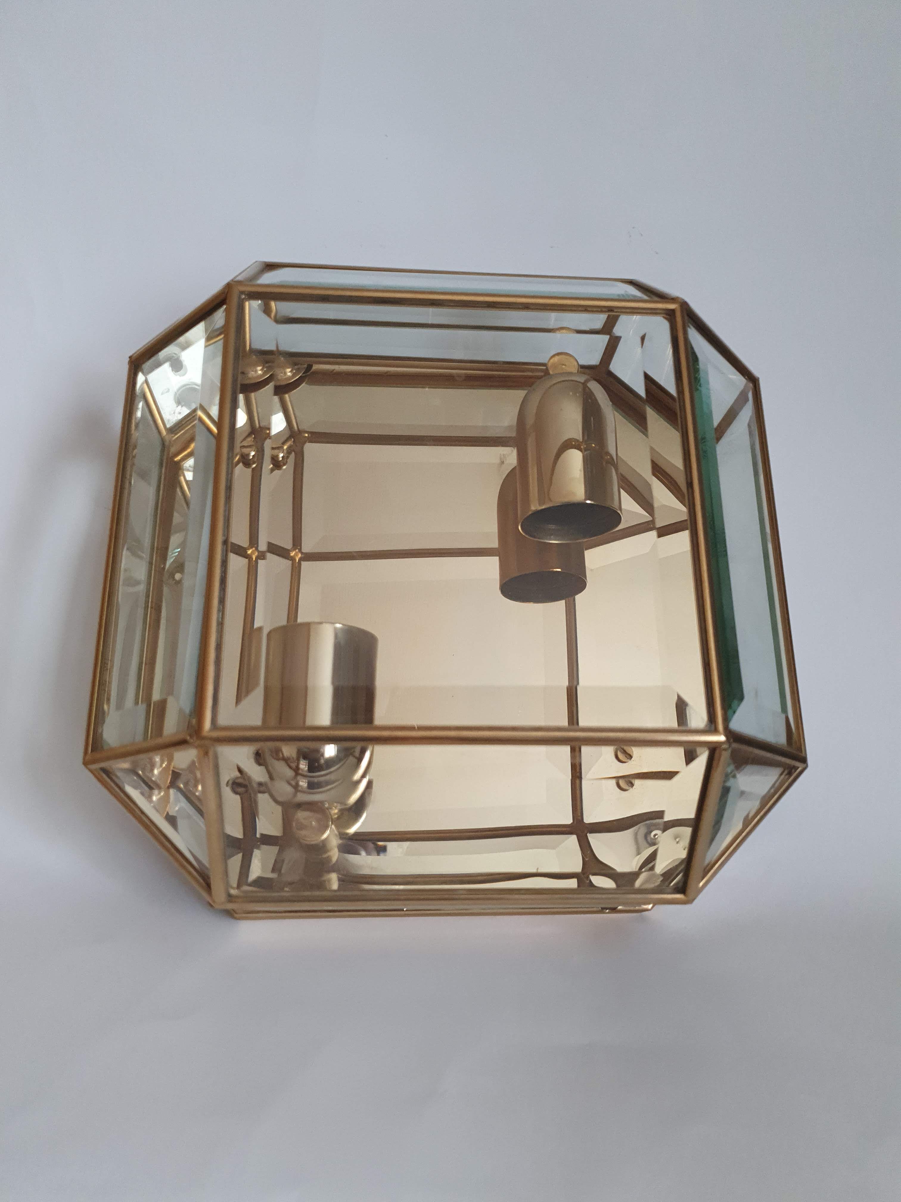 Brass wall lamp beveled glasses