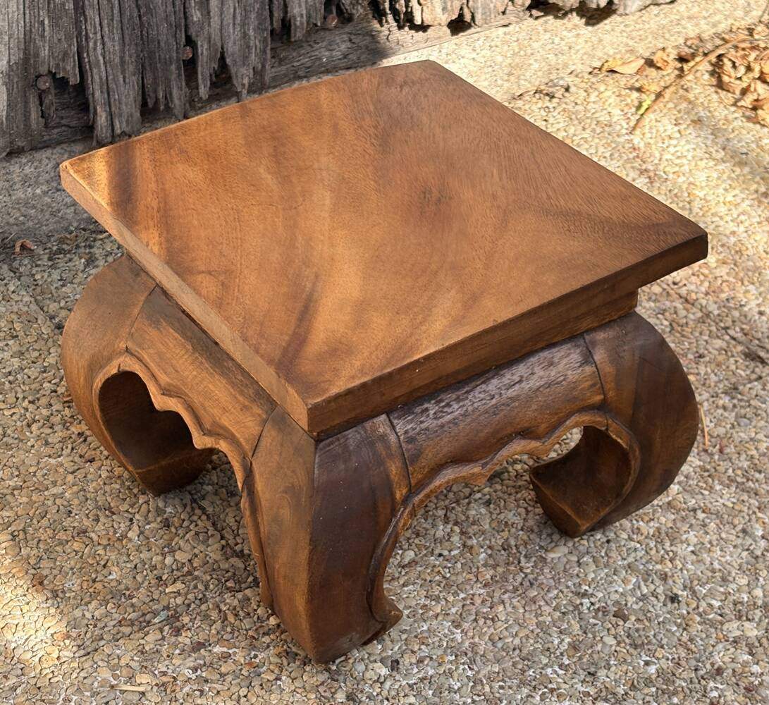 Carved wooden opium holder, traditional Asian style.