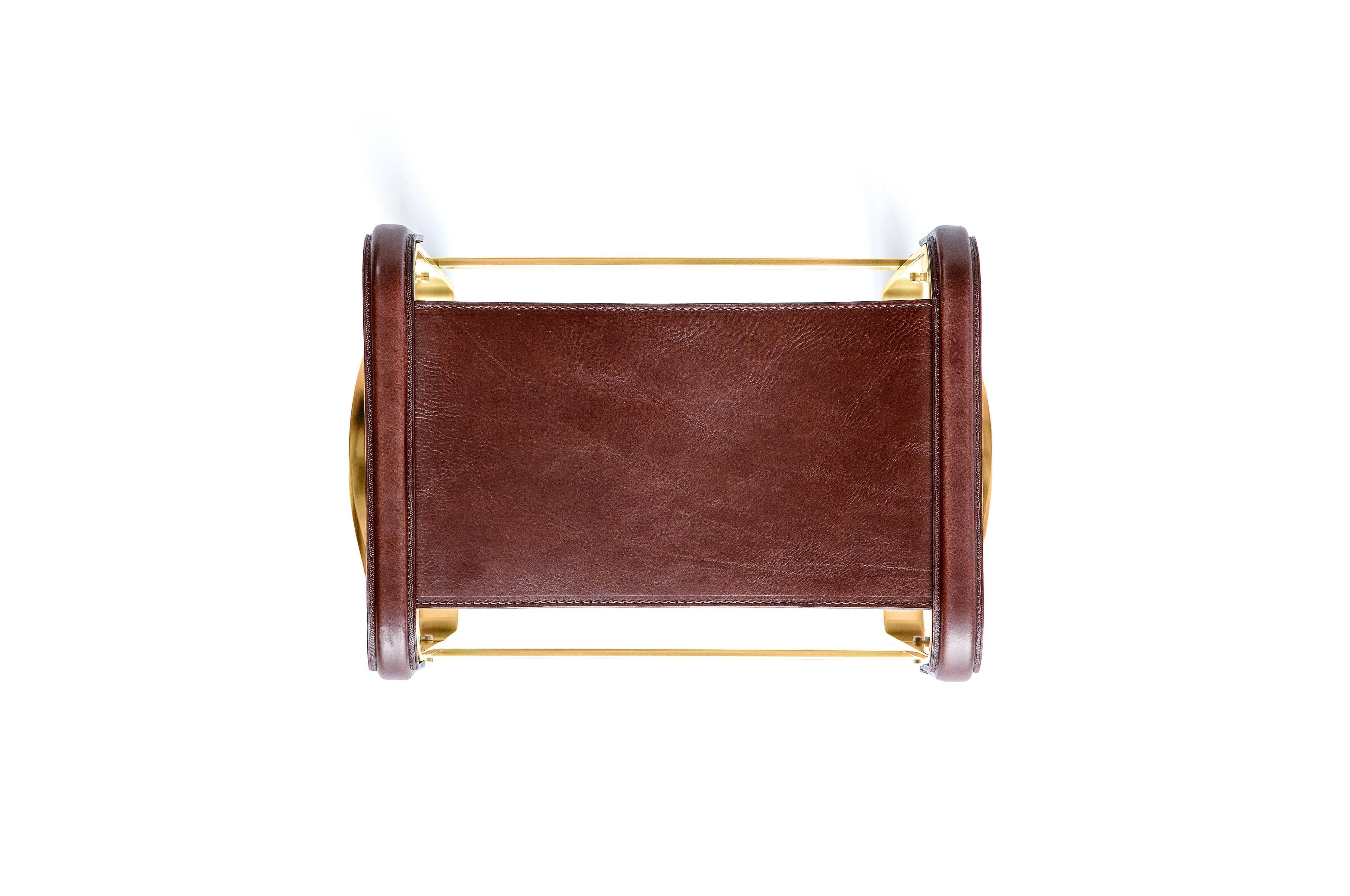 Contemporary kitchen stool, aged brass metal and cognac leather.