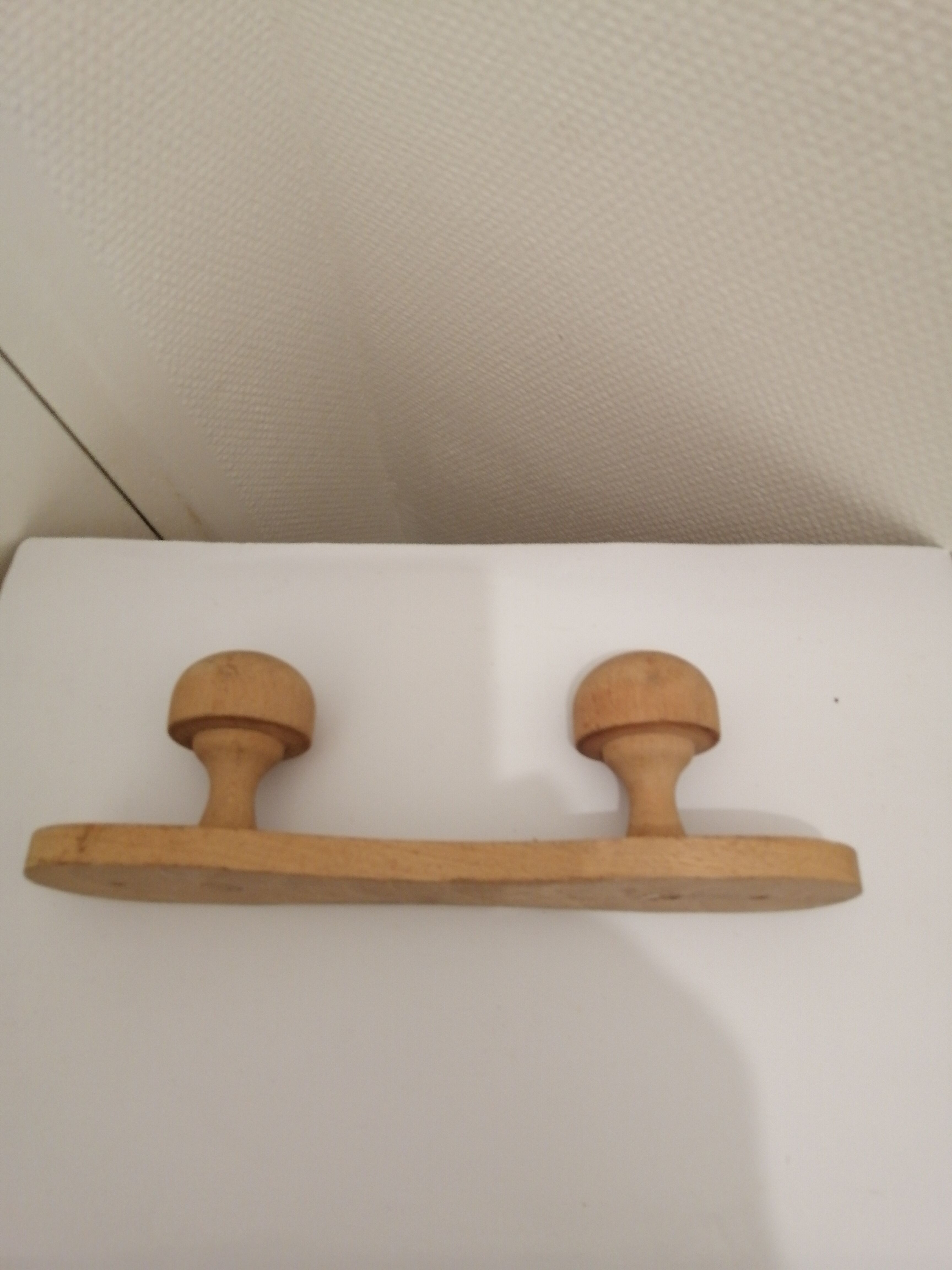 Wooden wall coat rack