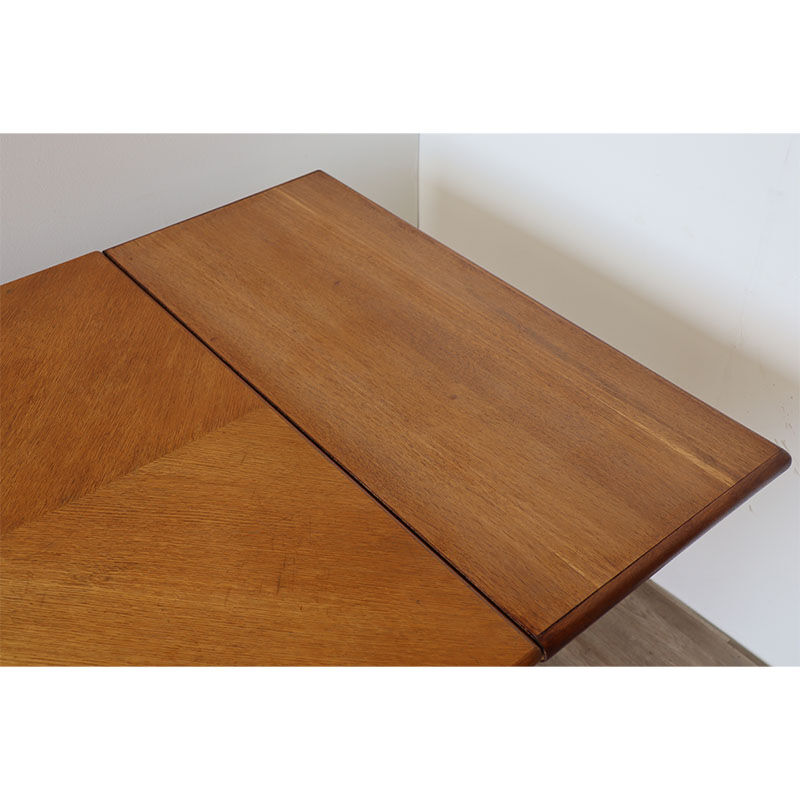 Vintage extendable dining table in wood and metal base, 1950