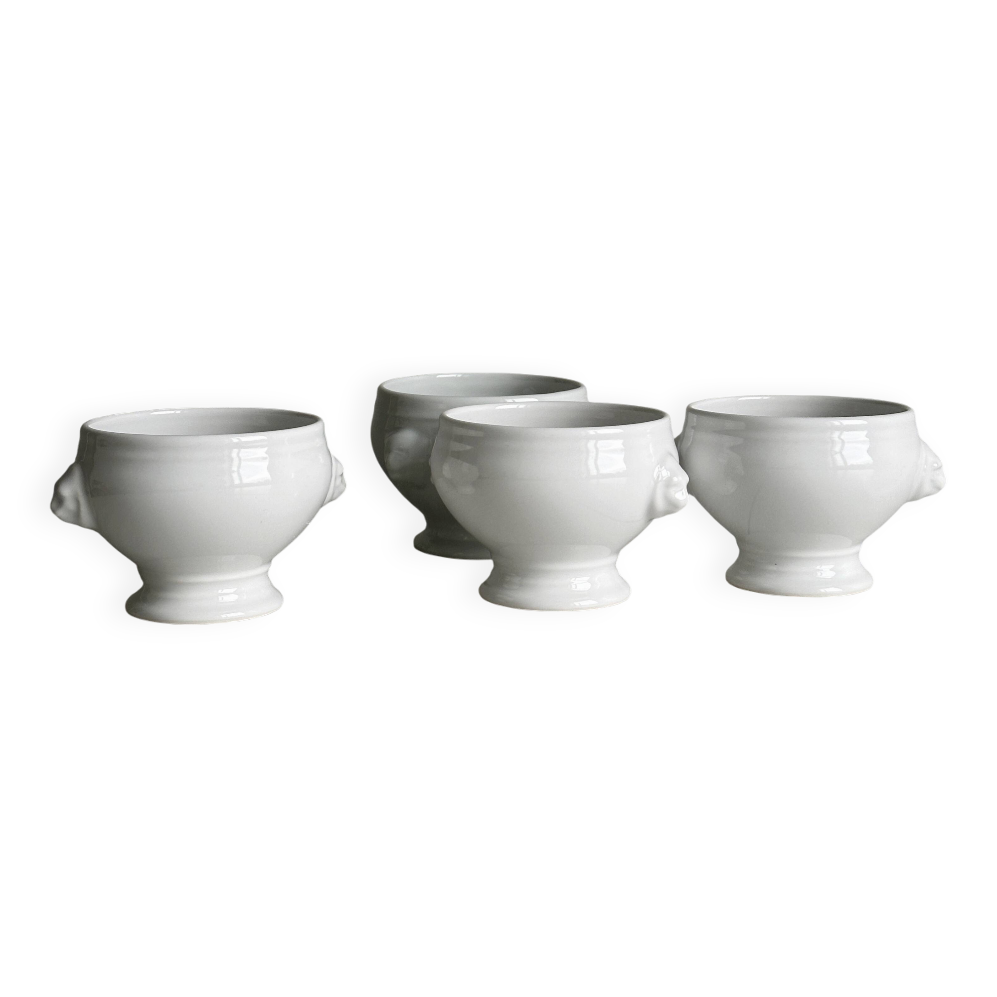 4 white porcelain bowls