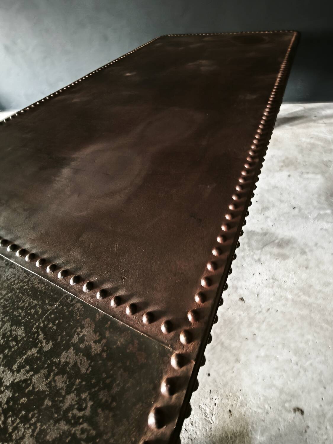 Riveted industrial table