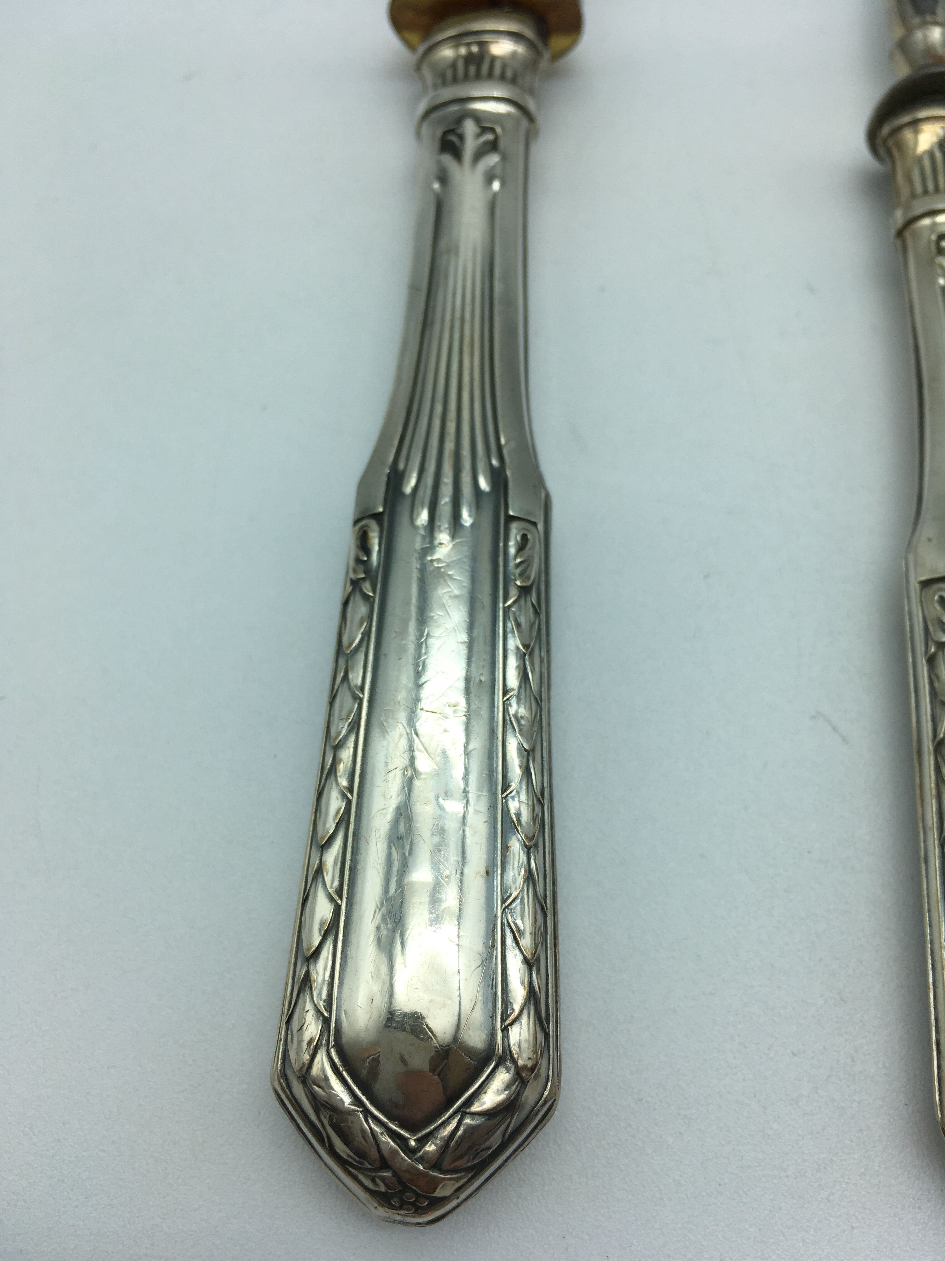 Box of filled silver salad cutlery