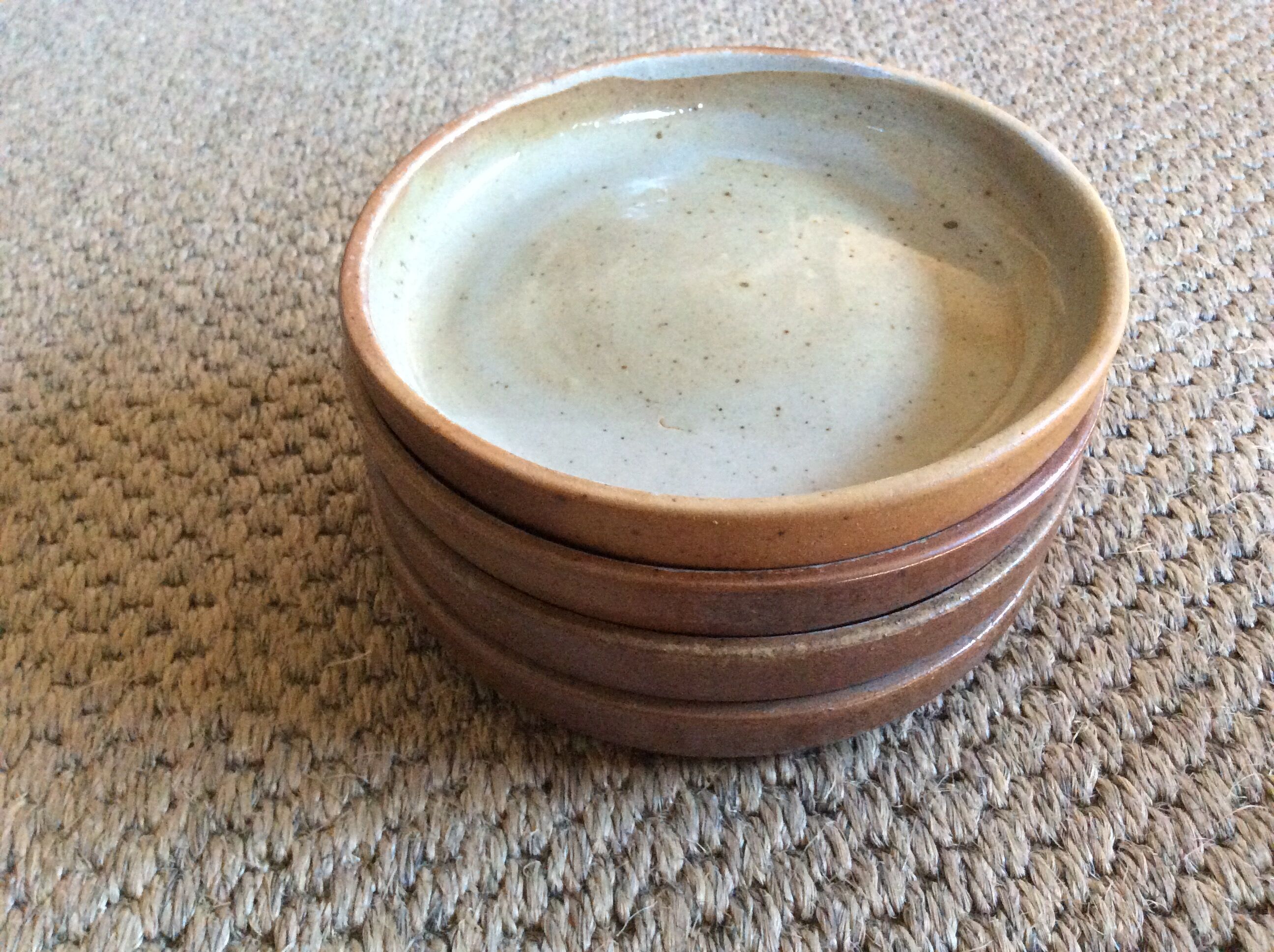 Series of 4 stoneware plates