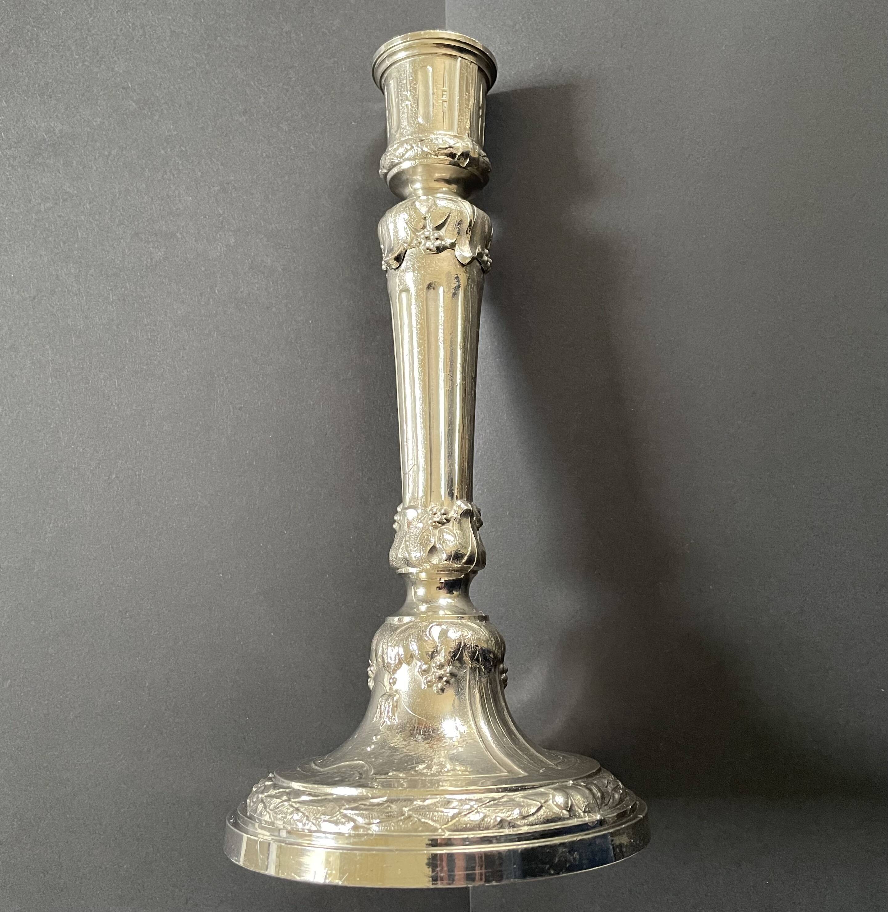Antique silver-plated candlesticks in classic style