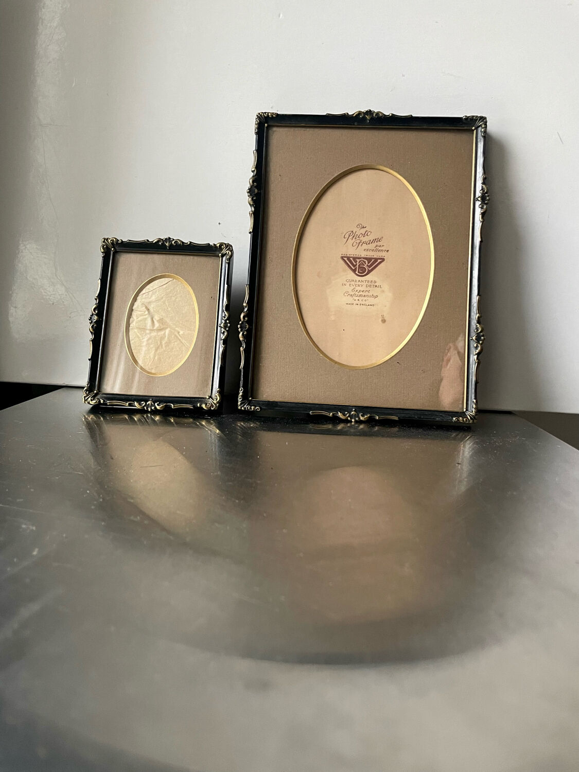 Pair of English Antique Metal Picture Frames in 2 different sizes