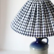 Vintage table lamp Hautlalampe: blue Alsace stone base and pleated Vichy shade.