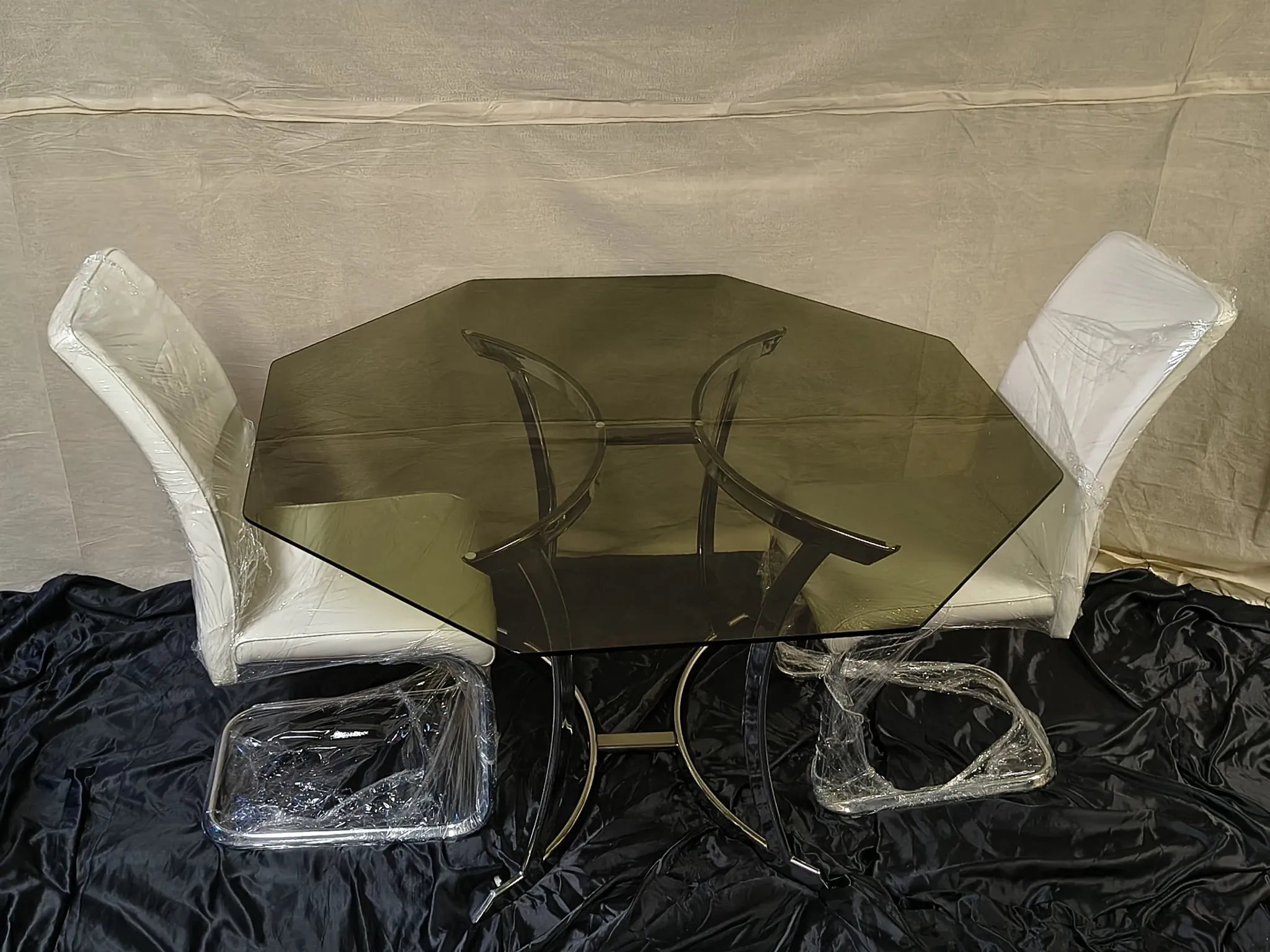 Smoked glass octagonal table from the early 1970s.