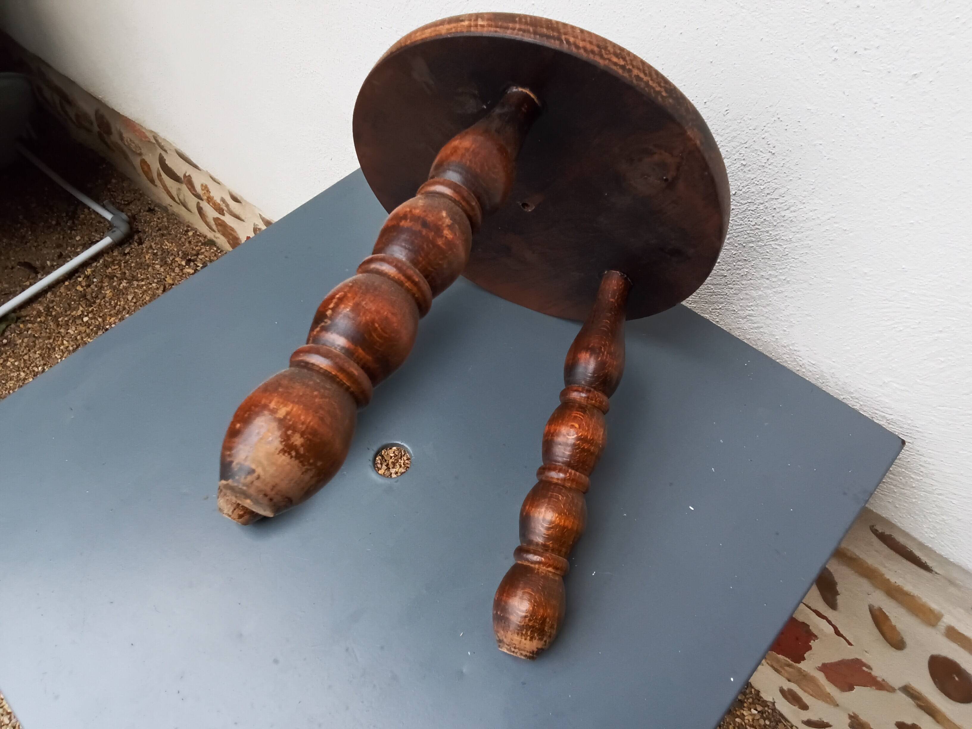 Wooden tripod stool