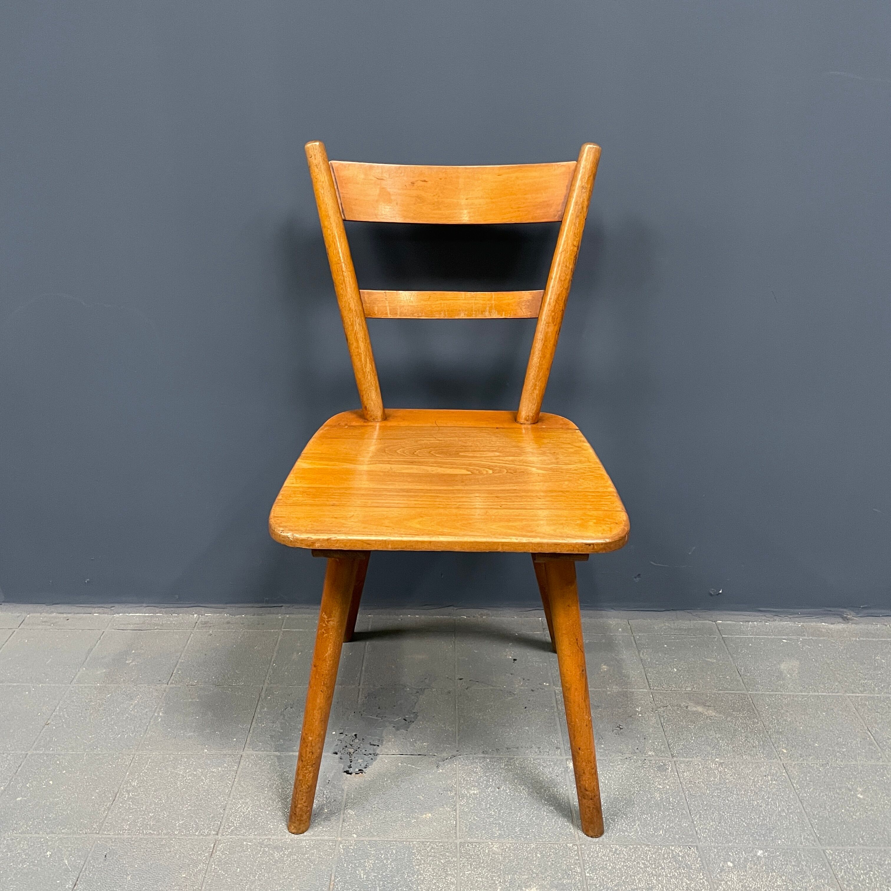 Set of eight german stick chairs from the 1950