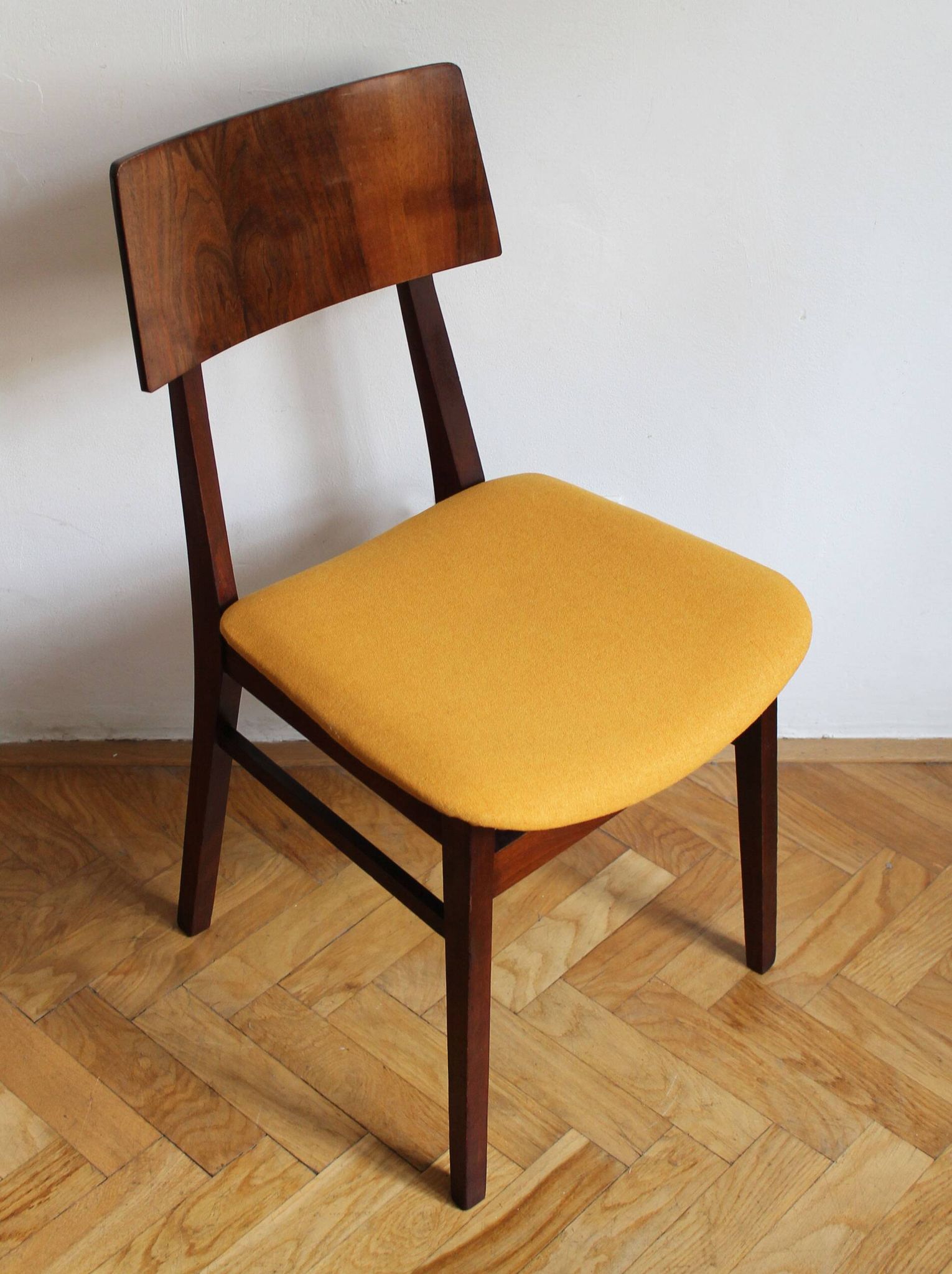 Vintage dining chair from the 1960s, Scandinavian style, wood and fabric.