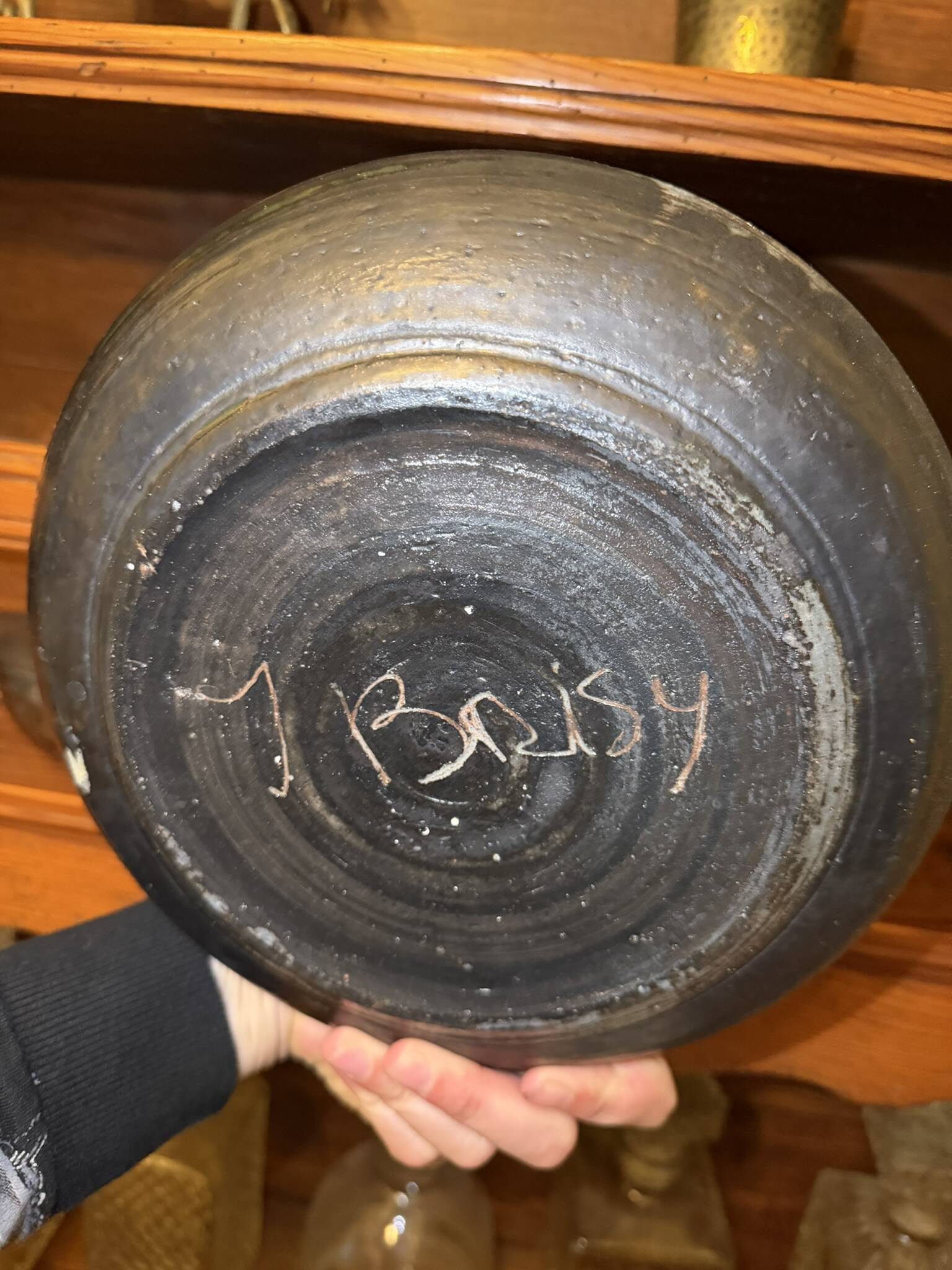 Stoneware plate signed J. Brisy