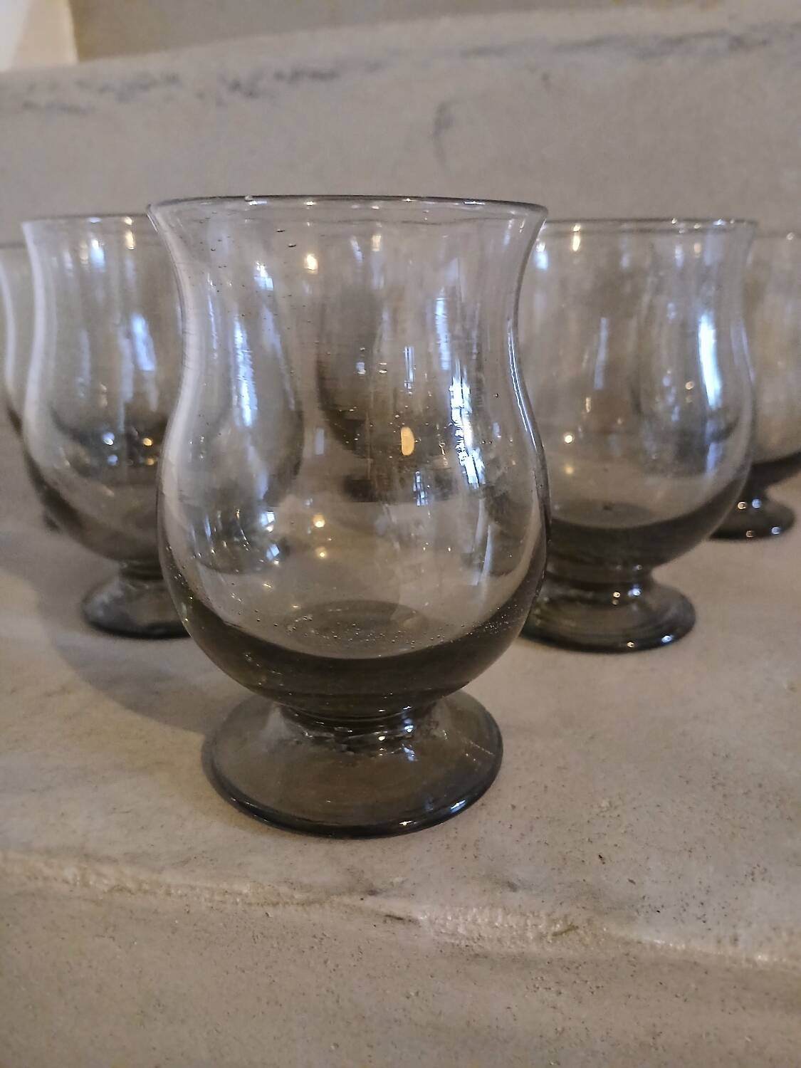 6 old smoked glasses with bubbles